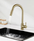 Sink Faucet,360°Pull-Out Spray,Brushed Steel Hot and Cold Rotation (Gold) in a modern kitchen sink with running water.