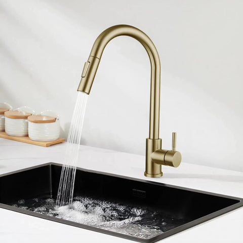 Sink Faucet,360°Pull-Out Spray,Brushed Steel Hot and Cold Rotation (Gold) in a modern kitchen sink with running water.