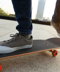 Skateboarder using 5.25 Inch Skateboard Trucks 139mm Aluminum With 52mm Wheels ABEC 7 Bearings 1.25 Inch Hardware 2mm Riser Pads