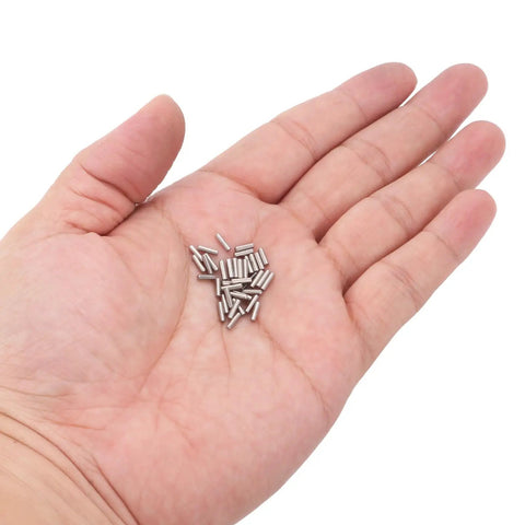 Hand holding 50 PCS 1.6Mm By 6Mm Stainless Steel Dowel Pins Kit For Shelves And Fasteners Silver Finish Durable Corrosion Resistant Hardware