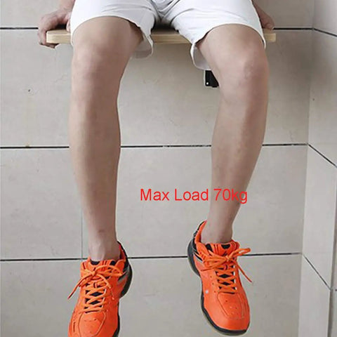 Heavy Duty Folding Triangle Brackets For Shelves supporting a wooden bench with a person seated, showing a 70kg max load indication.