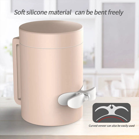 Image of a silicone kitchen utensil holder with a soft flexible design on a kitchen counter.