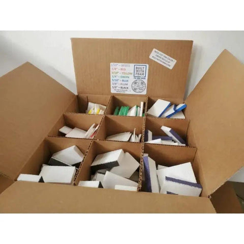 Premium Foam Wall Flattening Shim Set Featuring 900 Plus Varying Thickness Shims And Quick Read Depth Gauge To Smooth Drywall Cracks Fast, open box with assorted foam shims.