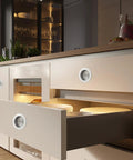 Recessed Pocket Door Pull Handles 2 3 4 Inch Round Finger Flush Pulls installed on modern kitchen cabinets, brushed 304 stainless steel.