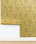 Straight Up Pink Vintage Floral Gold Metallic Wallpaper That Brings Major Style Points To Any Spot With Quick Paste Routine And Sustainable American Made Specs Type I Fire Safe Wallcovering Solid Finish on wall, showing floral pattern.