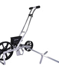 Pro Grade Precision Garden Seeder With 7 Seed Plates for Home Gardeners, Sweet Corn Planter and Seed Drill on prepared soil.