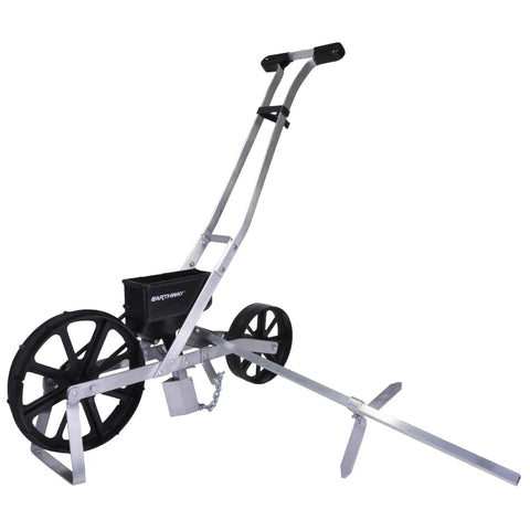 Pro Grade Precision Garden Seeder With 7 Seed Plates for Home Gardeners, Sweet Corn Planter and Seed Drill on prepared soil.