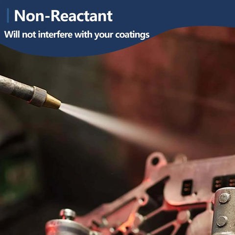 Sandblasting garnet abrasive nozzle spraying onto a metal component — close-up view