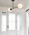 Two Light Globe Semi Flush Ceiling Light In Matte Black With White Glass Shades in modern entryway