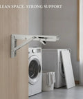 Folding Shelf Bracket Stainless Steel Wall Mount For Drop Leaf Tables And Workbenches in laundry room, folded against wall