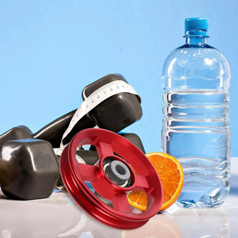 Two Piece Fitness Pulley Wheel Replacement For Gym Cable Systems with red aluminum pulley, dumbbells, and water bottle