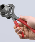 Cobra ES Extra-Slim 10 Inch Pump Pliers with narrow jaws gripping a metal pipe, ideal for screws, bolts, and wire rope.