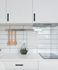 Two Pack 3.75 Inch Matte Black Cabinet Pulls for Kitchen Cabinets and Dressers 96mm Hole Centers Sleek Door Handles installed on white cabinets