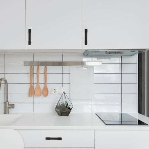 Two Pack 3.75 Inch Matte Black Cabinet Pulls for Kitchen Cabinets and Dressers 96mm Hole Centers Sleek Door Handles installed on white cabinets