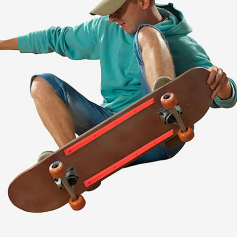 Skater using Abs Rail Guards For Longboard And Electric Skateboard with impact resistant construction in orange.