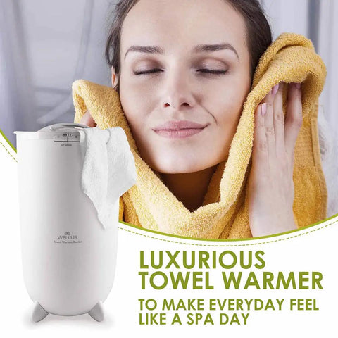 Woman enjoying warm towel beside Extra Large Towel Warmer Bucket For Two Towels Robes And Blankets Heats Towels Inside And Out
