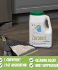 Zorbent ultra absorbent powder for all liquid spills beside dustpan and brush, commercial-grade, 16x absorbent, no dust, no odor.