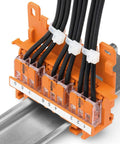 Go To Connection Terminal Set With 225 Pieces And 4 Mounting Adapters in use, installed on metal rail with black wires