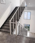 Tough As Nails Black Metal Stair Railing Balusters along modern staircase with black marble steps.