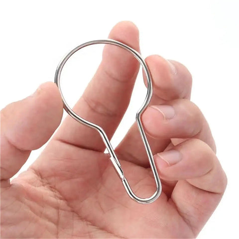 Person holding 150 Pcs No Fuss Gourd Shaped Shower Curtain Hooks Rustproof Glide Roller Hanging Rings for Bathroom Rod