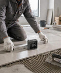 Straight Shooting Digital Angle Finder And Level With A Super Grippy Magnetic Base And Punchy Backlit Display For Woodworking Construction And Quick Home Repair Jobs in use during flooring installation.