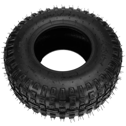 Close-up of one tire from the set of 2 145/70-6 tubed knobby tires with inner tubes for mini bikes, quad go karts, ATVs, UTVs, 6 inch rims.