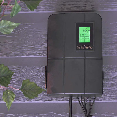 Smart Low Voltage AC Transformer with WiFi, 200W, mounted on a wall, features digital display, ETL certified for outdoor use