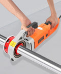 Heavy Duty 2300W Electric Pipe Threader With Six Dies And Carrying Case in use on a steel pipe with precision grip.