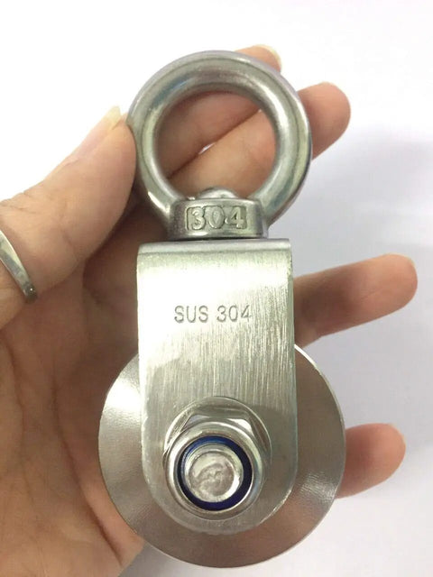 Beefy 304 Stainless Steel V Shaped Pulley held in hand, showcasing size and material details for heavy lifting applications.