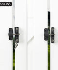 Heavy Duty Key Lockable Double Sided Gate Latch For Outdoor Fences secures yard, black latch installed on white wooden fence.