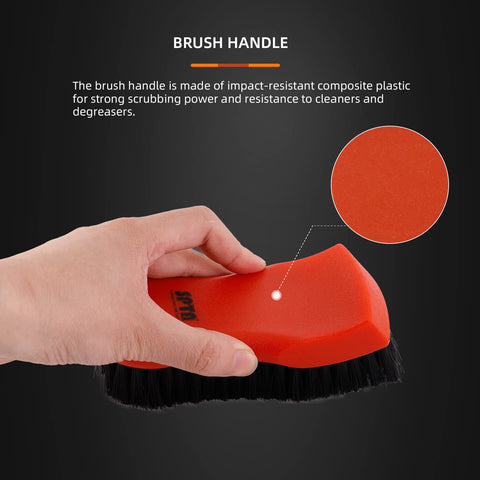 Close-up of hand holding brush from Three Piece Car Detailing Brush Kit With Microfiber Interior Brush And Tire Cleaning Brush