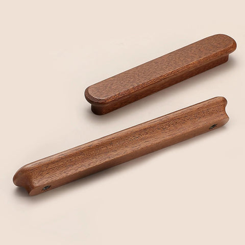 Wooden drawer handles with natural finish, showing front and side view