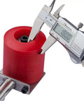Upgrade Your DIY Woodworking Game With This Manual Edge Banding Machine Wheel with red polyurethane roller and caliper measuring.