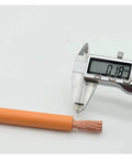 Heavy Duty Ev Charging Cable Built Tough For The Daily Grind Features Pure Copper Wiring with caliper measuring 0.18mm thickness.