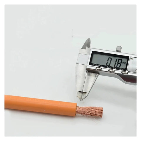 Heavy Duty Ev Charging Cable Built Tough For The Daily Grind Features Pure Copper Wiring with caliper measuring 0.18mm thickness.