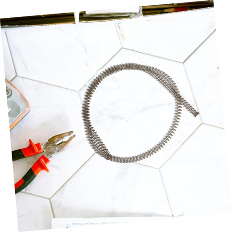 Pro Grade Portable Folding Umbrella Spring Replacement Featuring Slick Auto Pole Mechanism Beast Mode Metal Construction on tiled surface.