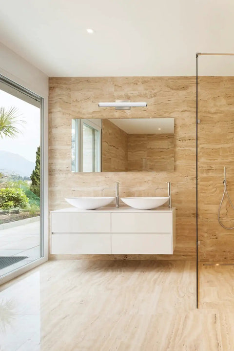 Luxurious bathroom with 24 Inch LED Vanity Light Bar With 3 In 1 Switchable Color Temperature Warm Neutral Cool White Over The Mirror Modern Cylinder Brushed Nickel Bathroom Fixture.