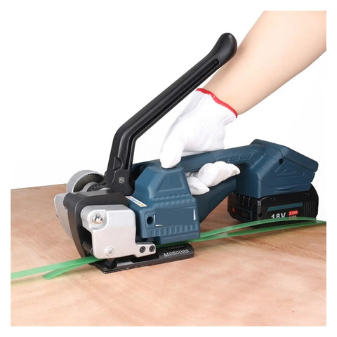 Portable Electric Strapping Machine With Two Batteries For PP PET Band Belt Packing Tools, used to secure green strap.