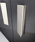 No Sweat Peel And Stick Finger Pull Handles For Cabinets, screwless adhesive drawer knobs on black surface.