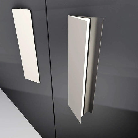 No Sweat Peel And Stick Finger Pull Handles For Cabinets, screwless adhesive drawer knobs on black surface.