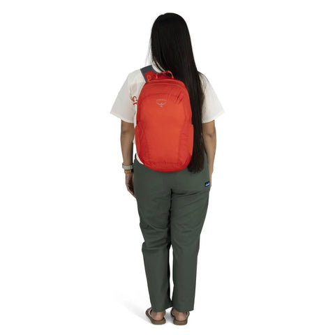 Person wearing Ultralight Collapsible Travel Day Pack For On The Go Trips Packable 18 L Expandable Luggage Bag Tundra Green