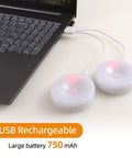 4 Pack Rechargeable Puck Lights With Remote And Touch Control connected to laptop via USB