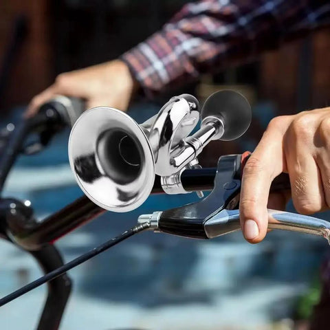 Classic Retro Bike Horn For Ecotric Beach Cruiser Ebike Produces Loud Snail Tone To Alert Pedestrians Instantly While Delivering Immersive Vintage Vibes Perfect For Cruising Neighborhoods And City Ramps With Ease. Chrome 18cm horn on bike handlebar