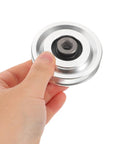 Durable Aluminum Pulley Wheel For Home Gym And Cable Machines, Smooth Bearing Wheel For Upper Body Workouts, High Pulley System Replacement Part, 70mm Outer Diameter held in hand