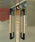 Stainless Steel And Wood Barn Door Handle Set Heavy Duty Two Sided Sliding Bar Pull With Hardware Custom Length installed on glass doors.