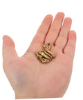 Hand holding Brass Invisible Cylinder Barrel Hinges 25 Pack Small Concealed Jewelry Box Hinges For Hidden Cabinet Doors