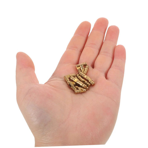 Hand holding Brass Invisible Cylinder Barrel Hinges 25 Pack Small Concealed Jewelry Box Hinges For Hidden Cabinet Doors