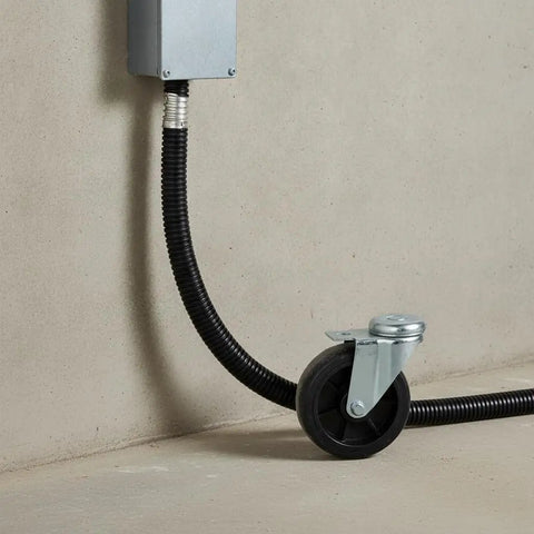 Built Tough Workhorse Corrugated Flexible Conduit Pipe With Compression Fitting Connector For Electrical Cable Routing And Wiring Harness Protection Rated At 20 Bar Pressure In A Sturdy 19 Millimeter Coil, installed with a gray junction box.