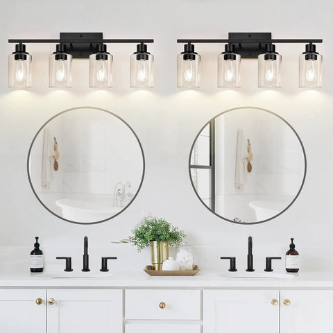 Sleek Matte Black Four Light Bathroom Vanity Wall Lamp With Thick Clear Glass Shades For Mirror Or Porch, view over vanity.