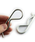 Close-up of 2 Pack Stainless Steel R Clips Hairpin Cotter Pins For Quick Securement M5x100 Zinc Coated, held in hand, silver finish visible.